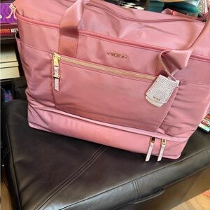 Pink Tumi Carlyn Weekender Bag